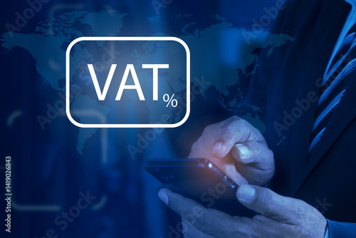 Businessman holding smartphone shows VAT on vitual screen. Concept of taxes payment optimisation business finance