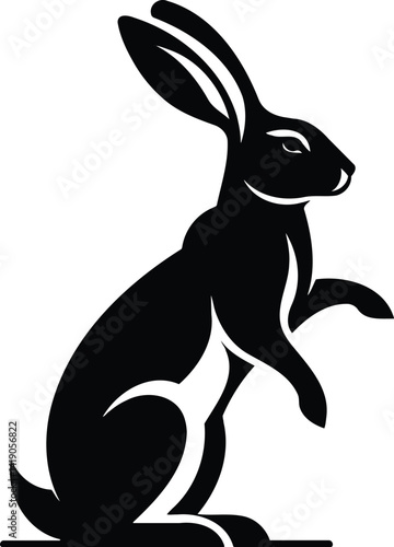 Rabbit silhouette standing alert with perked ears in modern style
