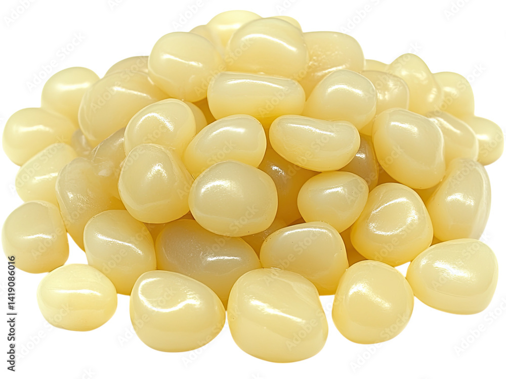 Fototapeta premium Creamy Yellow Polished Pebbles: A Collection of Smooth, Lustrous Stones for Decoration or Crafts