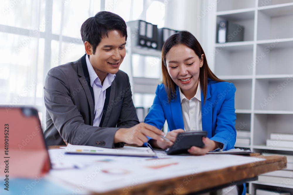 Team of Accounting business are calculating income-expenditure and analyzing real estate investment data on tablet computer, Financial and tax systems concept.
Team of Accounting business are calculating income-expenditure and analyzing real estate investment data on tablet computer, Financial and tax systems concept.