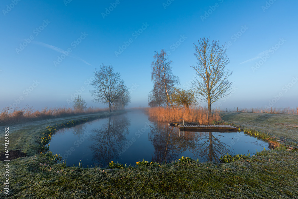 Morning fog on the Nije Wjittering canal, Friesland, Netherlands Kopie