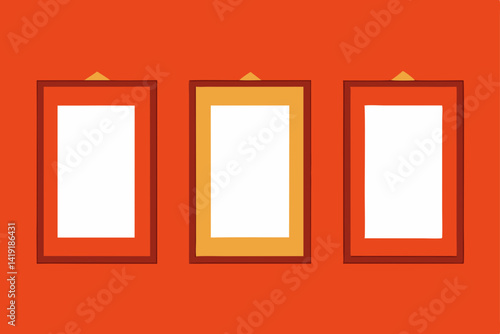 three picture frames on wall