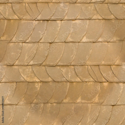 The old yellow tile wall. Yellow stone background. The texture of the tile. Brickwork. Seamless image.
