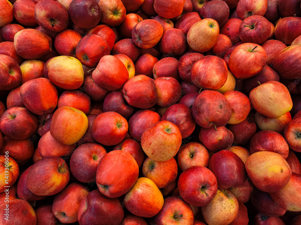 Red apples forming a colorful display at a farmer's Holesovice market in Prague, Czech republic, wallpaper, copy space