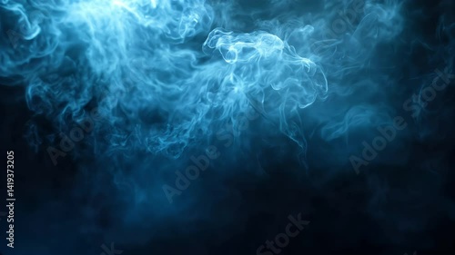 swirling blue smoke on black background with mysterious floating fog
