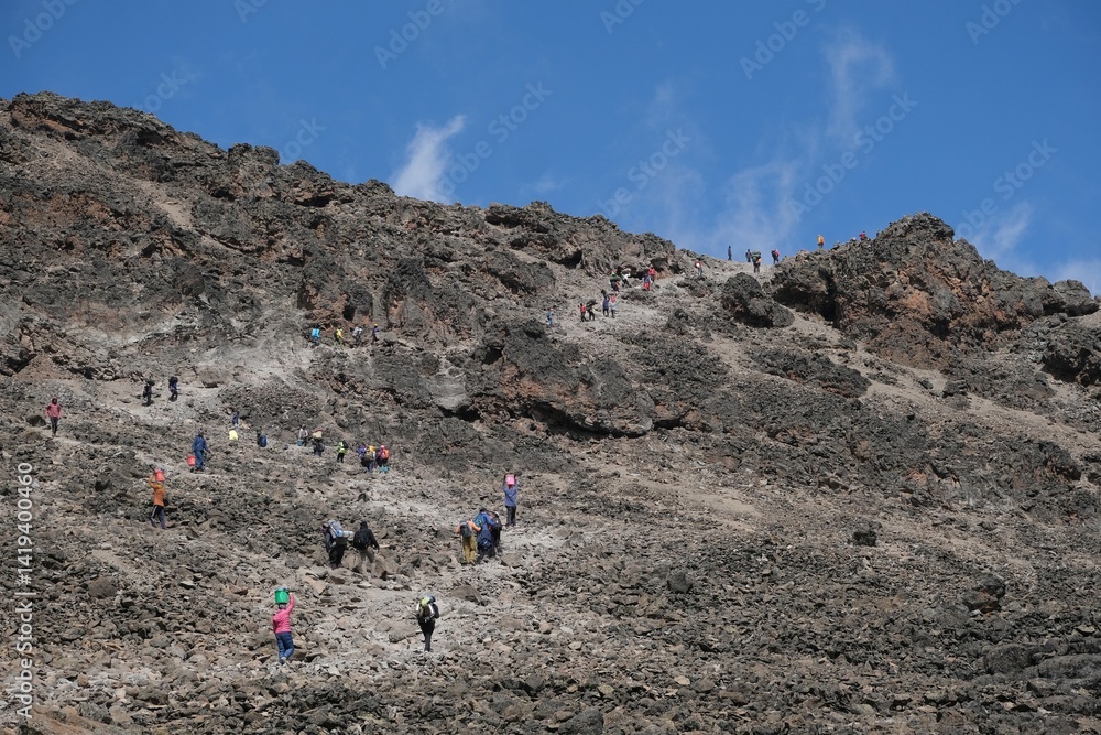 Group fo trekking people on trail from Barranco Hut to Barafu Camp, during trekking to Kilimanjaro Peak, Machame Route, Tanzania