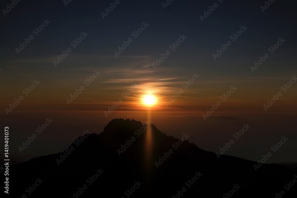 Sunset scenery with Mawenzi Peak on horizon during climbing to Uhuru peak on Kibo volcano (Kilimanjaro) – 5895 m. Tanzania
