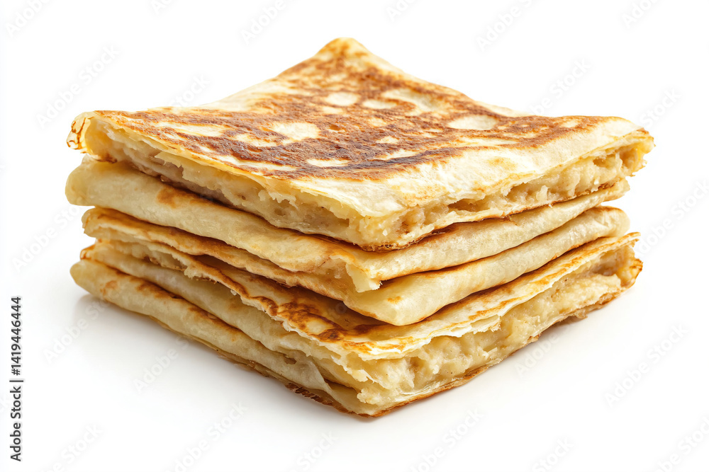 a stack of pancakes on a white surface a stack of pancakes on a white surface