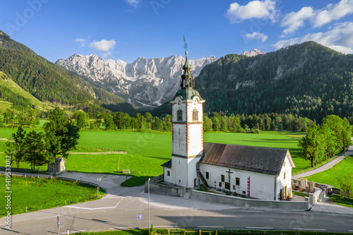 Obraz na płótnie Idyllic Alpine landscape with a church in Zgornje Jezersko, Slovenia w salonie