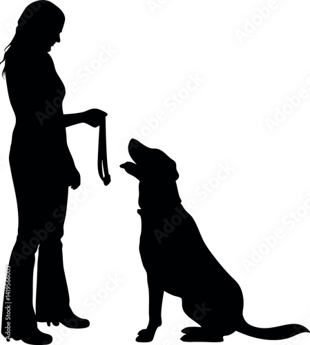 Silhouette of a Woman Holding a Treat for a Seated Labrador Dog on White