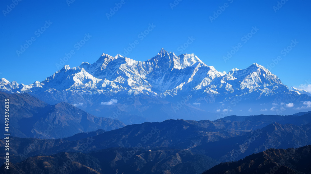 Fototapeta premium Snowy Peaks with Blue Sky Backdrop