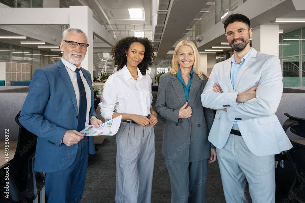 Successful business team posing in modern office environment Successful business team posing in modern office environment