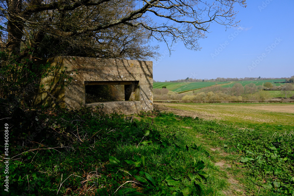 World war two gun emplacement by a field in the countryside. World war two gun emplacement by a field in the countryside.