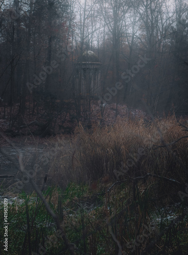 Eerie Watchtower in a Foggy, Overgrown Forest