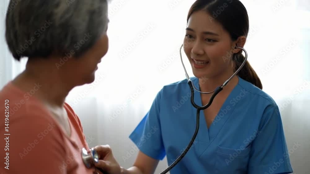 Compassionate Female Nurse Checking Elderly Woman's Heartbeat with Stethoscope at Clinic Compassionate Female Nurse Checking Elderly Woman's Heartbeat with Stethoscope at Clinic