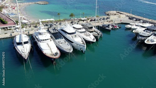 Aerial view of Mega Yachts in Cannes France by La Croisette Beach
