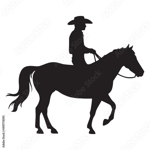 Silhouette of a cowboy riding a horse