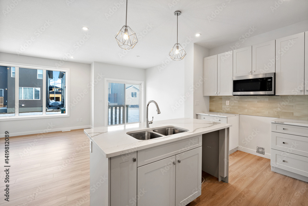 Fototapeta premium Kitchen with a white counter and a sink