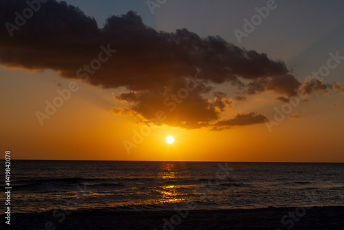 Sunsets Over Beaches, Palm Trees and Oceans