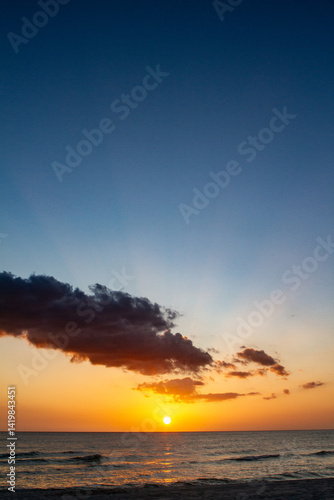 Sunsets Over Beaches, Palm Trees and Oceans