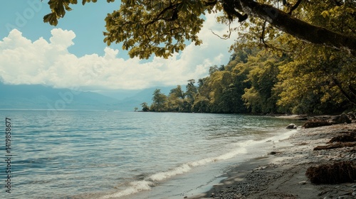 Wallpaper Mural A tranquil waterscape featuring a tree shore and mountainous horizon Torontodigital.ca