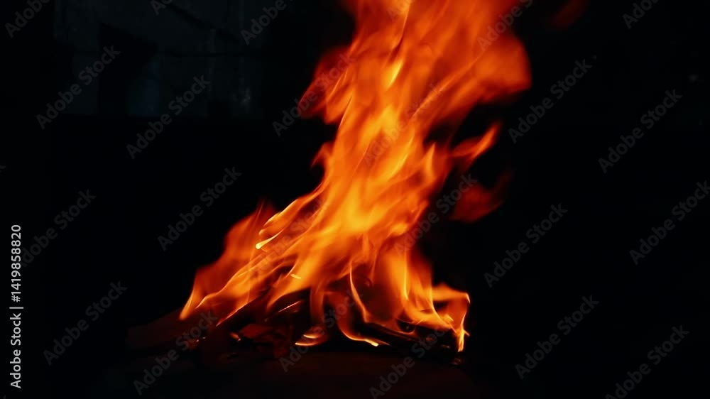 The hot embers of burning wood log fire. Firewood burning on stove. The hot embers of burning wood log fire. Firewood burning on stove.
