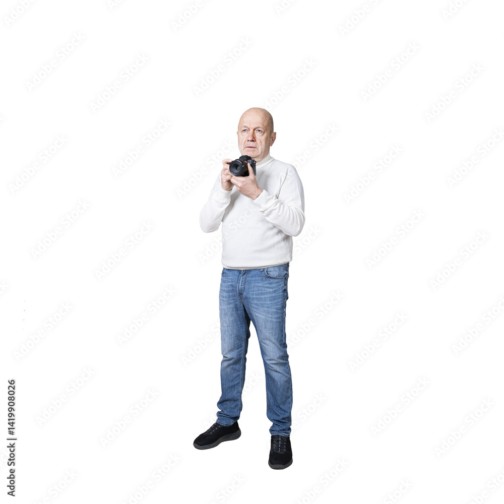 a man standing with a camera in his hands