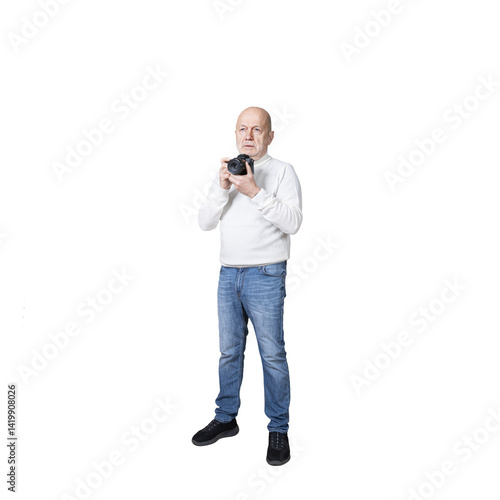 Obraz na płótnie a man standing with a camera in his hands w salonie