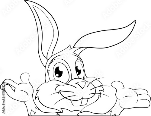 An Easter bunny rabbit cartoon character peeking around a sign