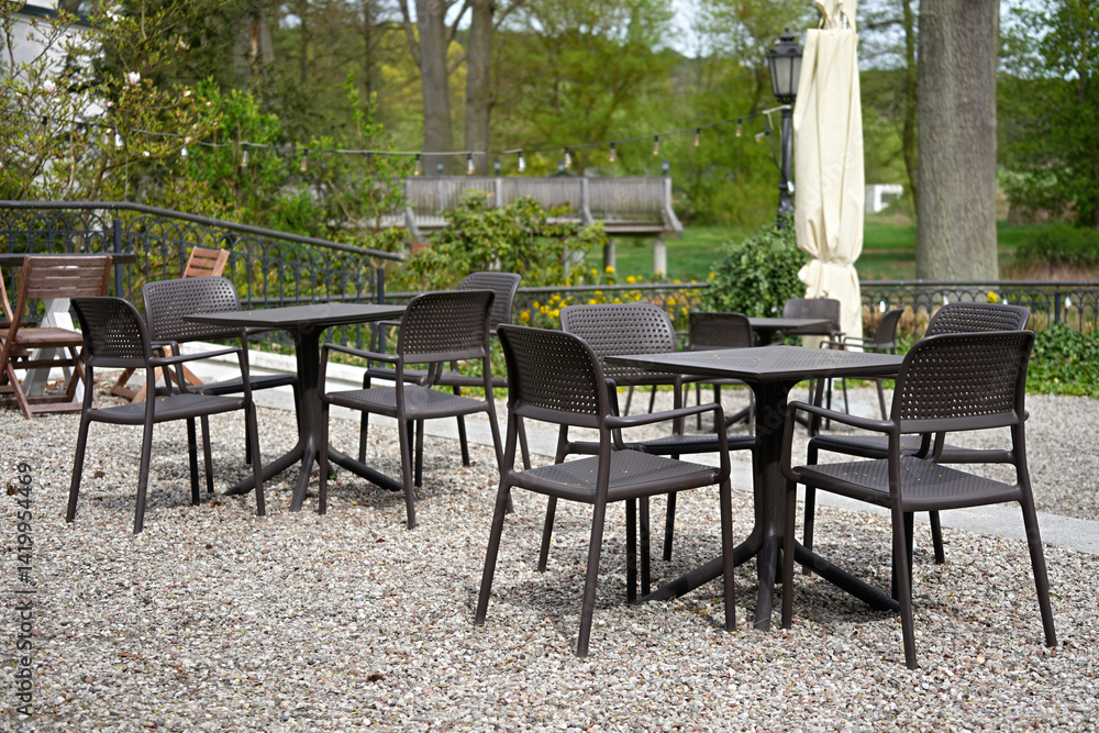 Cafe on the outdoor terrace with a beautiful view of nature's greenery Cafe on the outdoor terrace with a beautiful view of nature's greenery
