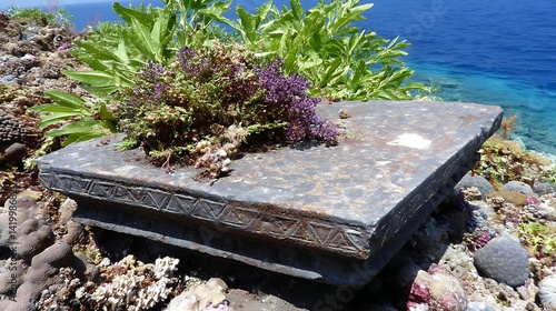 Obraz na płótnie Ancient Stone Slab with Inscriptions near Ocean Coastline Holiday Seaside Tranquility Scenery w salonie
