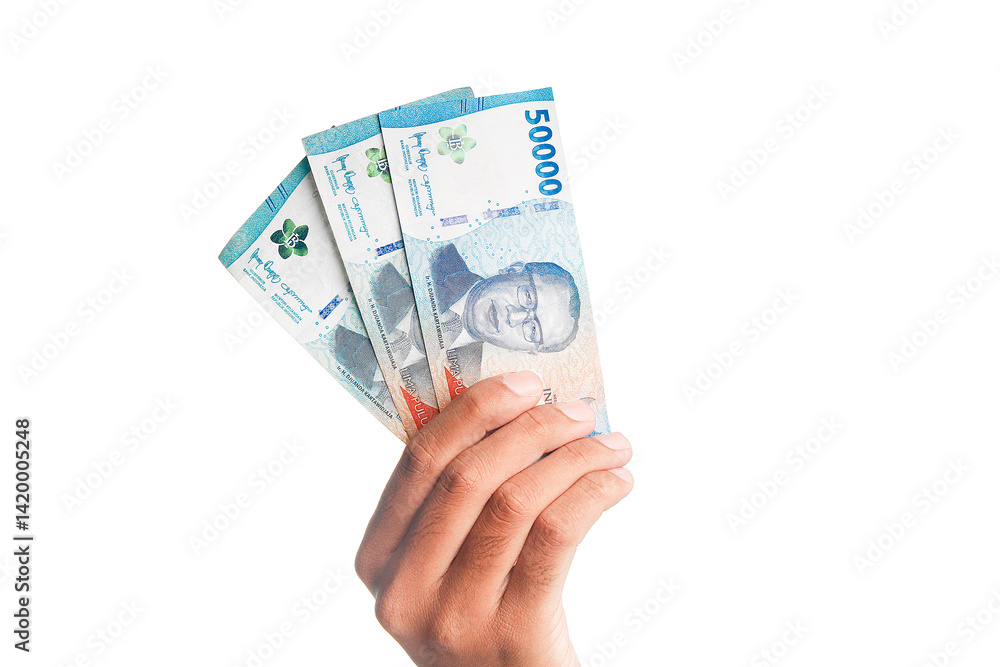 Hand Holding Indonesian Rupiah IDR 50000 Banknotes Isolated on White Background.Hand Holding Indonesian Rupiah IDR 50000 Banknotes Isolated on White Background. Hand Holding Indonesian Rupiah IDR 50000 Banknotes Isolated on White Background.Hand Holding Indonesian Rupiah IDR 50000 Banknotes Isolated on White Background.
