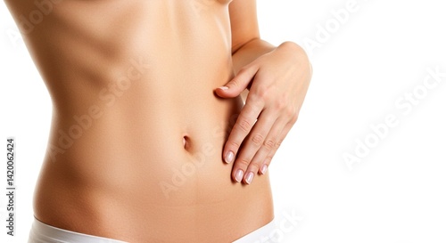 Close-up of a slim woman’s bare torso with a hand gently resting on the side of her waist
