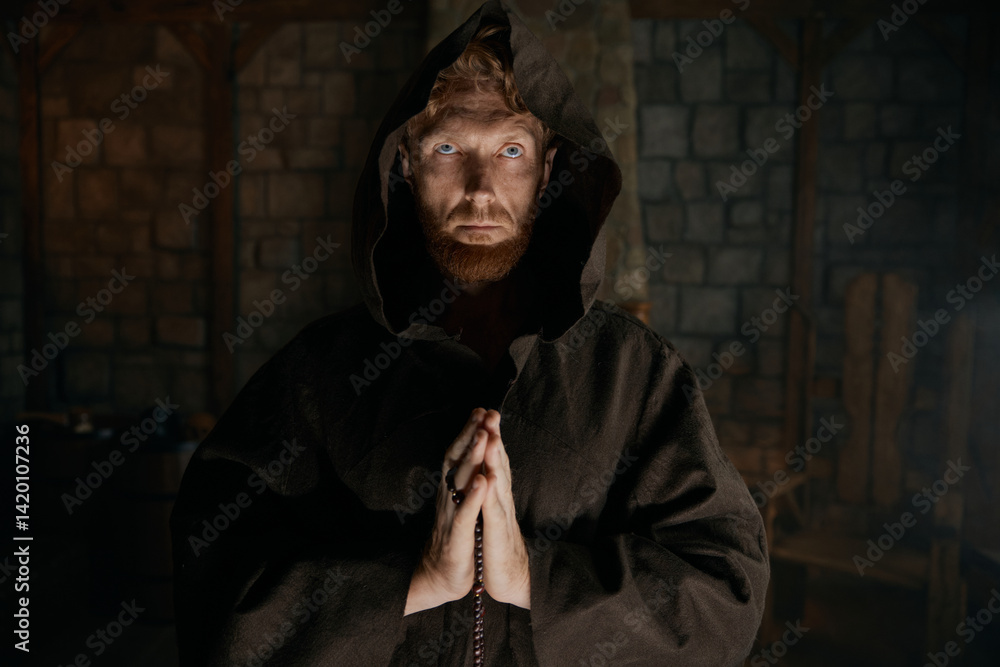Portrait of blessed priest praying having faith believe in God
