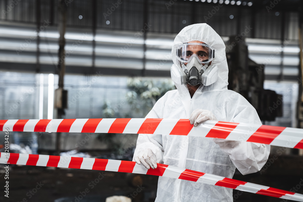 Fototapeta premium Workers in safety suits check chemicals in an old factory during a radiation emergency.