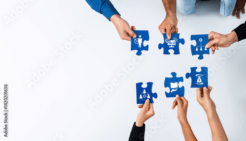 Obraz na płótnie A diverse group of hands assembles colorful puzzle pieces, symbolizing collaboration and teamwork in a strategic business setting. Ideal for teamwork concepts. Amity w salonie