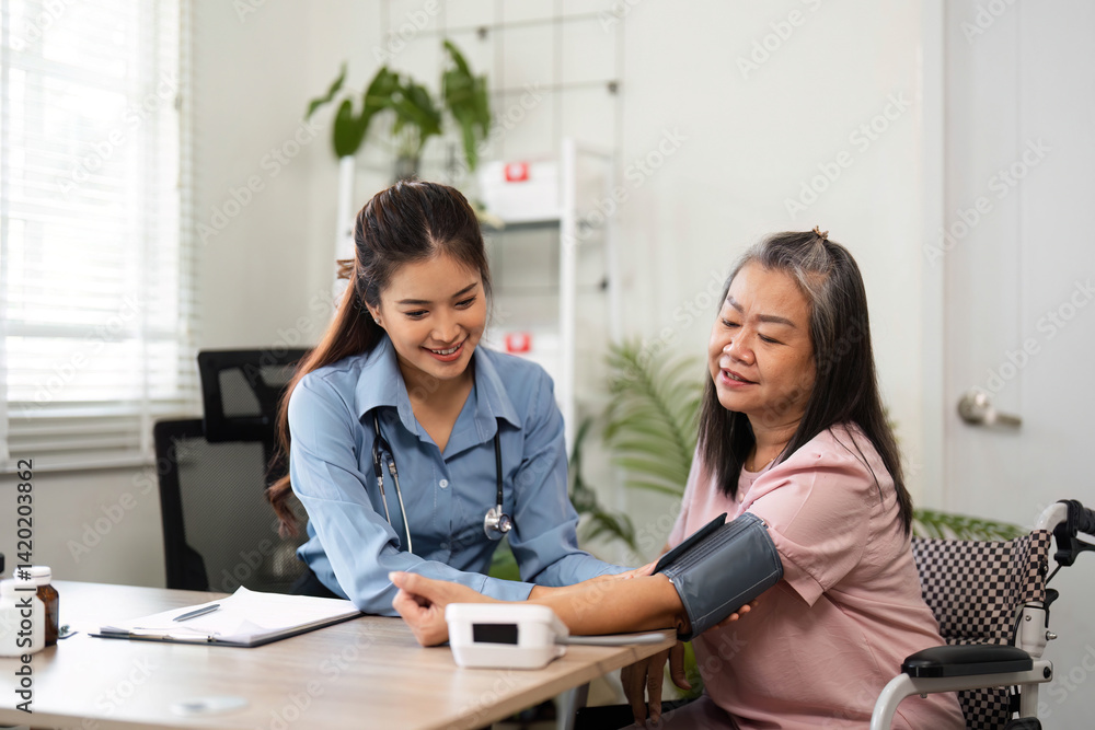 Healthcare and Patient Consultation. A nurse checks a senior patient's blood pressure during a friendly consultation. Healthcare and Patient Consultation. A nurse checks a senior patient's blood pressure during a friendly consultation.