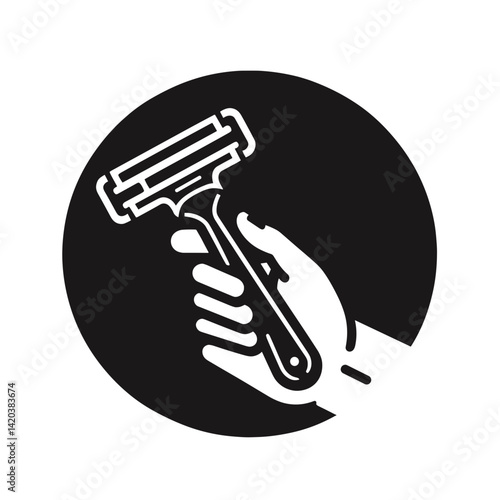 Hand holding a razor for shaving on a black background   in a round design
