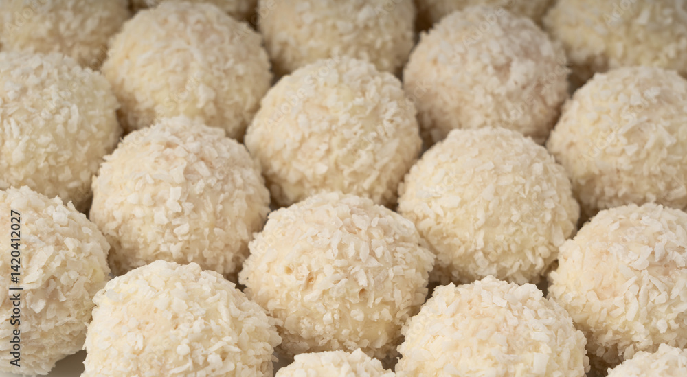 Coconut candies texture background, coco balls pattern. White truffle ball wallpaper, indian ladoo Coconut candies texture background, coco balls pattern. White truffle ball wallpaper, indian ladoo