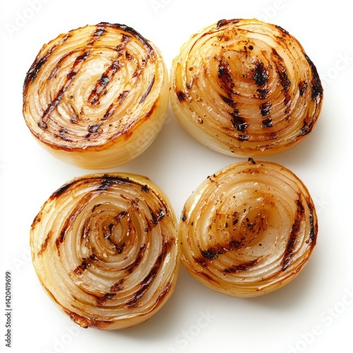 Close up shot of four grilled onion halves on a white background view