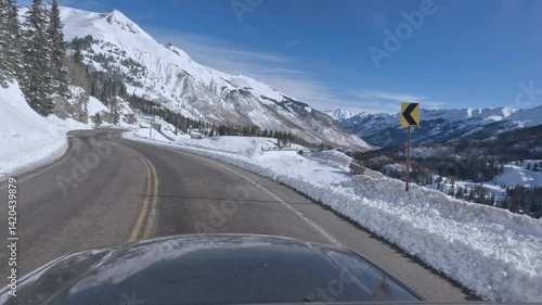 POV road trip along the Million Dollar Highway in winter through Colorado mountains 
