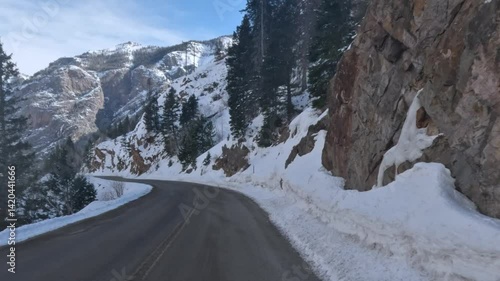 POV road trip along the Million Dollar Highway in winter through Colorado mountains 