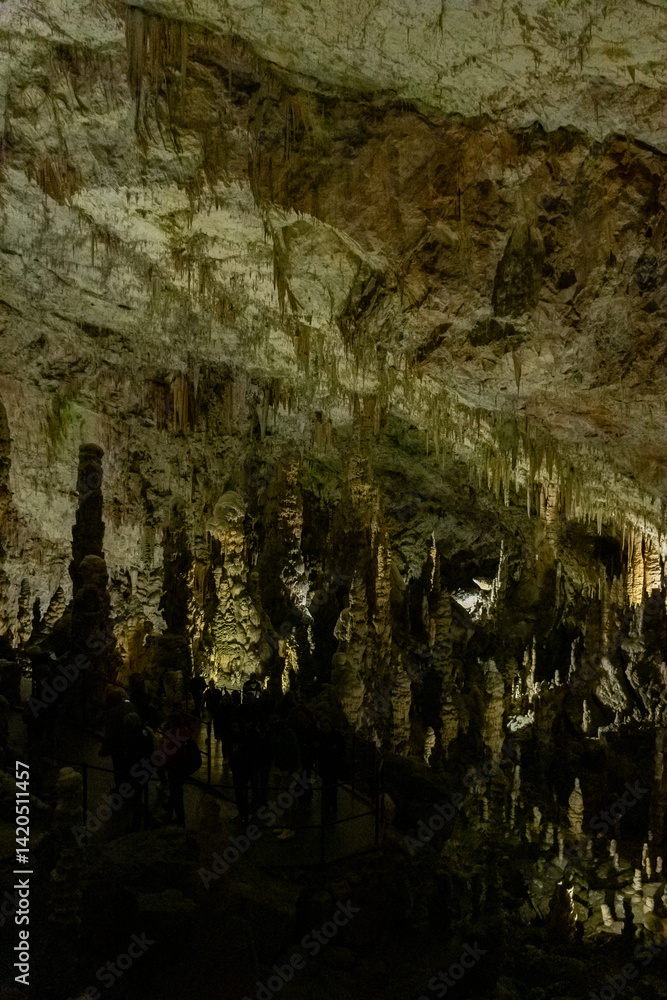 Exploring beautiful Postojna cave in Slovenia the most visited european cave. Thousands of stalagmites and stalactites
