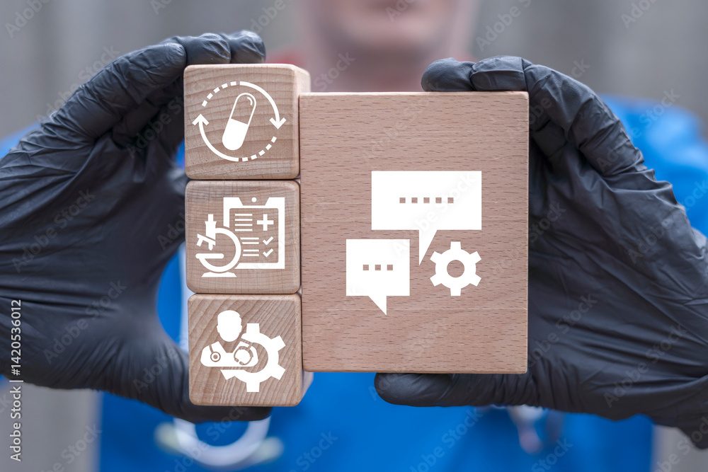 Doctor holding wooden blocks sees icon of speech bubbles with capsule pill symbolizing concept: medicine consultation. Concept of professional medical consultation and recommendation.