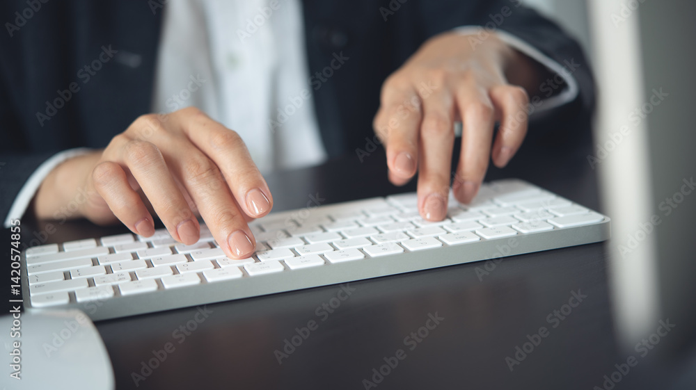 Closeup, business woman hand typing on desktop computer keyboard, online working, searching the information, surfing the internet on office table, remote work, online job, business background Closeup, business woman hand typing on desktop computer keyboard, online working, searching the information, surfing the internet on office table, remote work, online job, business background