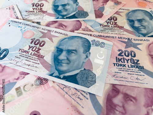 Fototapeta Naklejka Na Ścianę i Meble -  Turkish Banknotes featuring currency values of 100 and 200 Lira