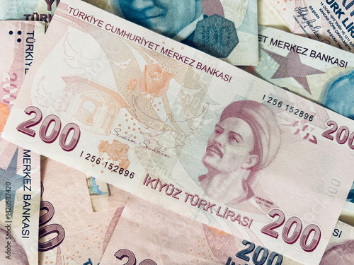 Fototapeta Naklejka Na Ścianę i Meble -  Turkish Banknotes featuring currency values of 100 and 200 Lira