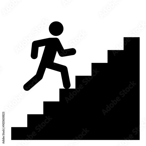 階段を駆け上がる人のシルエット