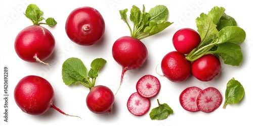 Obraz na płótnie Close-up of fresh red radishes with green leaves and a sliced radish showing the white interior. w salonie