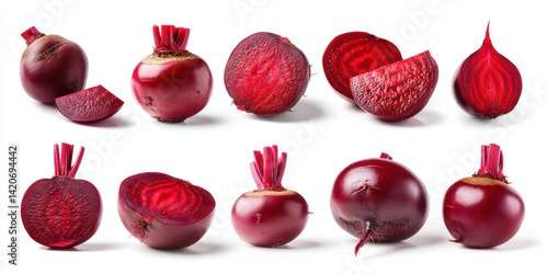 Obraz na płótnie Close-up of a fresh red beetroot cut in half next to a whole beet on a white background. w salonie